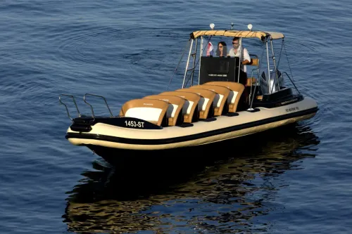 Captain at the helm on calm waters
